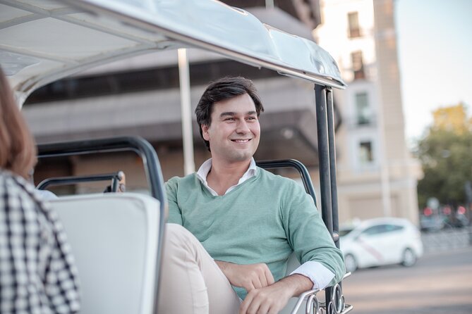 Madrid Welcome Tour with Local Guide in Eco Tuk Tuk Private - Atocha station: Madrid’s busiest rail hub in one ride-through moment