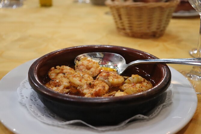 Malaga Wine & Tapas Small Group Guided Tour - Meeting on Calle Marqués de Larios, then stepping off the postcard path