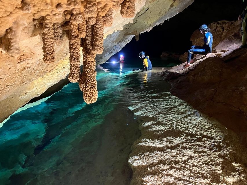 Mallorca: Aquatic Cave Exploration Guided Tour - The cave interior route: headlamps, formations, and careful movement