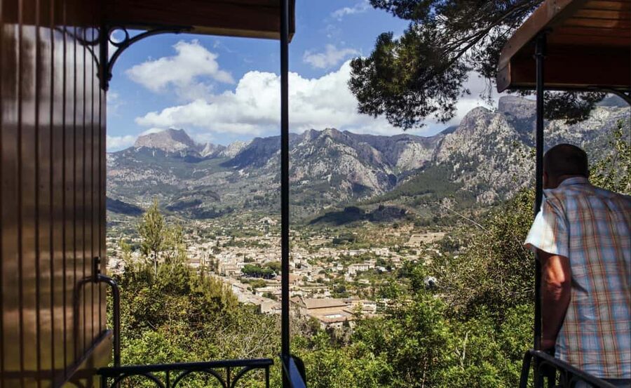 Mallorca: Exclusive Soller Train and Tram Half-Day Tour - Coach pickup from North Mallorca, then a Palma station breather