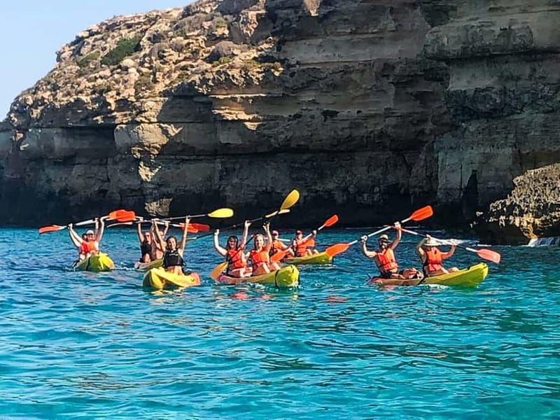 Mallorca: Sea Caves Kayaking Tour, Snorkeling & Snack - Inside the sea caves: color, light, and safety practices you can feel
