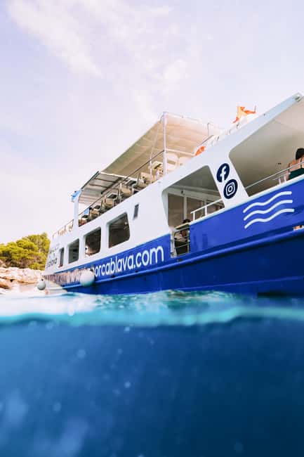 Menorca: Coves and Beaches Boat Trip w/ optional Paella - Cala Turqueta’s pine-framed beach time