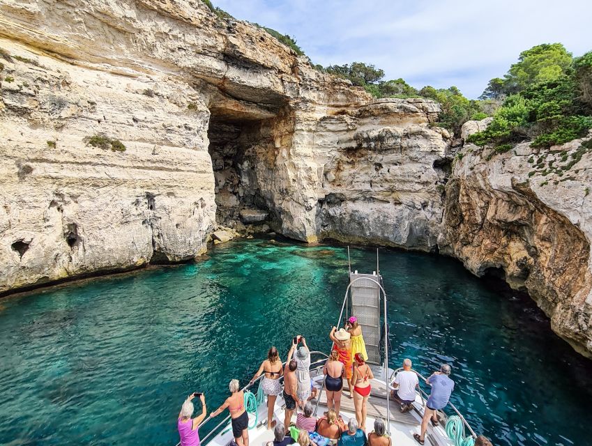 Menorca: Full-Day Boat Tour with Paella Lunch - Shade, umbrellas, and beach comfort planning