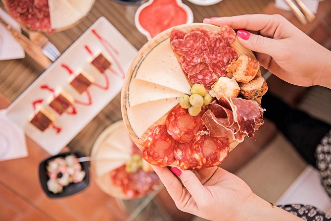 Montserrat Half-Day Tour with Tapas and Gourmet Wines - Santa Maria square, cloisters, and why you should bring walking shoes