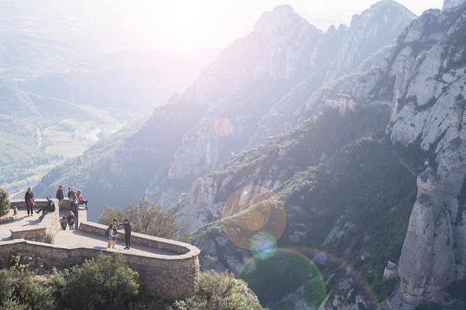 Montserrat with Cog-Wheel Train & Black Madonna Priority Access - Santa Cova Options, Echoing Interiors, and the Audio-Visual Montserrat Experience