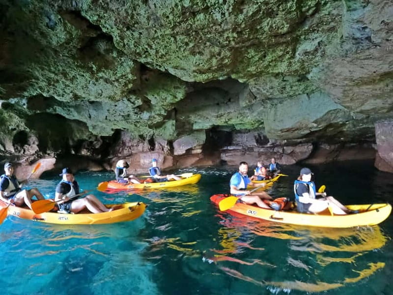 Puerto Mogán: Guided Adventure Kayak Tour in Caves & Snorkel - The wild beach snorkeling stop over volcanic reefs