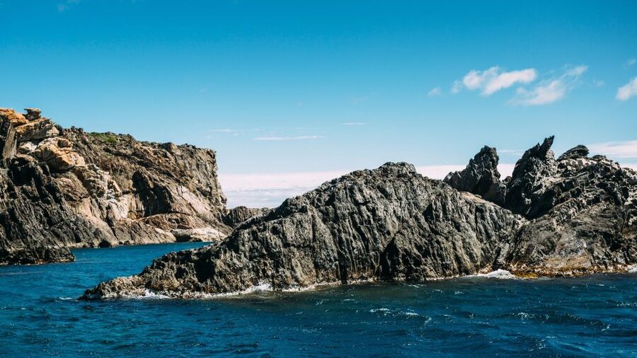 Roses: Cap de Creus & Port Lligat Boat Tour w/ Cadaqués Stop - Sailing out of Roses toward Cap de Creus Nature Park