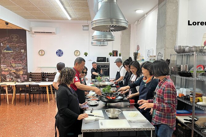 Seafood paella cooking class, tapas and visit to Ruzafa market. - Paella and Sangria in Ruzafa, a 3.5-Hour Food Lesson With a Party Mood