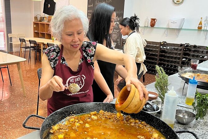 Seafood paella cooking class, tapas and visit to Ruzafa market. - The Meal After Cooking, Tomato Salad, Dessert, Coffee, and Mistela