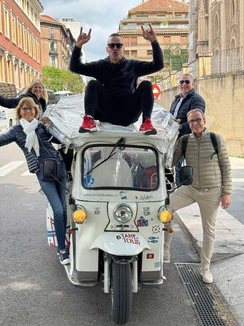 "See Madrid Differently: A Premium Private Tuk Tuk Ride" - Plaza de Cibeles, Alcala Gate, and Retiro Park in Tuk Tuk Time