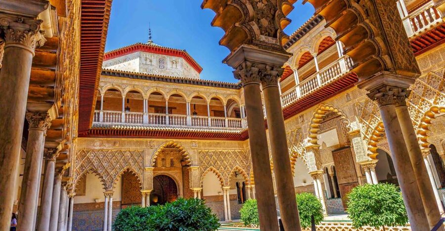 Seville: Alcázar Guided Palace Tour with Priority Access - Royal rooms and courtyards: how the guide connects Islamic, Baroque, and Renaissance clues