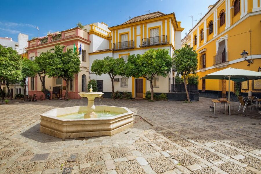 Seville: Relaxing City Bike Tour with a Tour Guide - Jardines de Murillo: shade, orange trees, and a slower rhythm