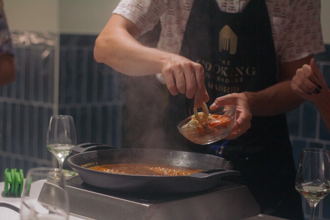 Taste of Spain: Tapas Cooking Class with Bottomless Wine Pairing - Entering The Cooking Clubhouse in Central Madrid