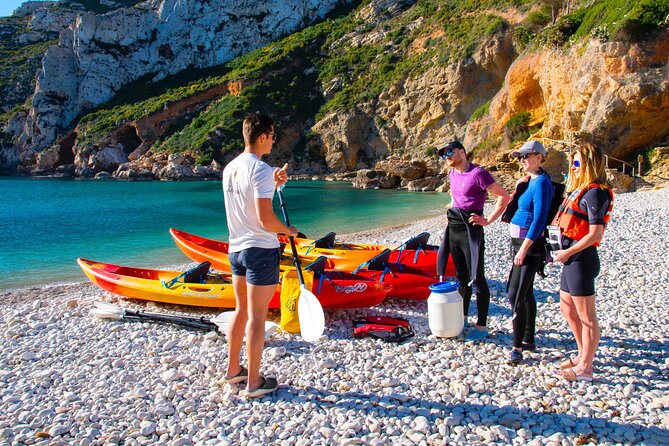 Uncharted Caves & Snorkelling Heaven: Cala Granadella Kayak Tour - Stop 1, Playa de la Granadella: launch point and first sea views
