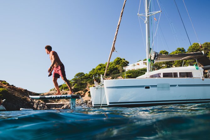 Unforgettable experience in Catamaran Ibiza - LAGOON 400 - Stop 5: Cala dHort beach time, snorkel, SUP, and lunch decisions