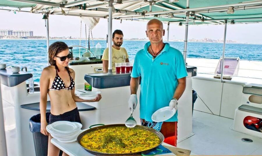Valencia: Sailing Catamaran Cruise with Valencian Lunch - The Swim Stop Off the Crowds: Anchoring, Sunbathing, and Jump-Time