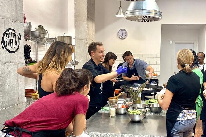 Valencian paella cooking class, tapas and visit to Ruzafa market. - Ruzafa market meeting point, fresh shopping, and how paella becomes personal