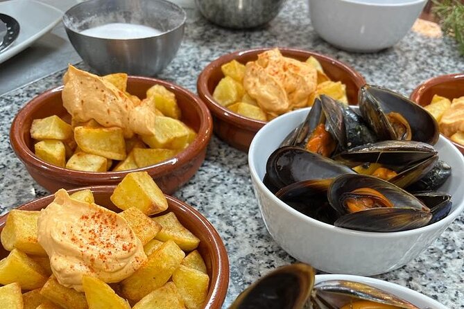 Valencian paella cooking class, tapas and visit to Ruzafa market. - What to expect from the group size and English-led setup