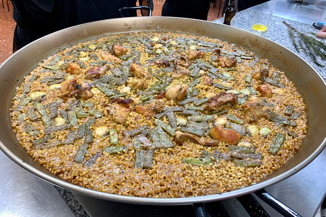 Valencian paella cooking class, tapas and visit to Ruzafa market. - Tapas, sangria workshop, and the moment the class really warms up