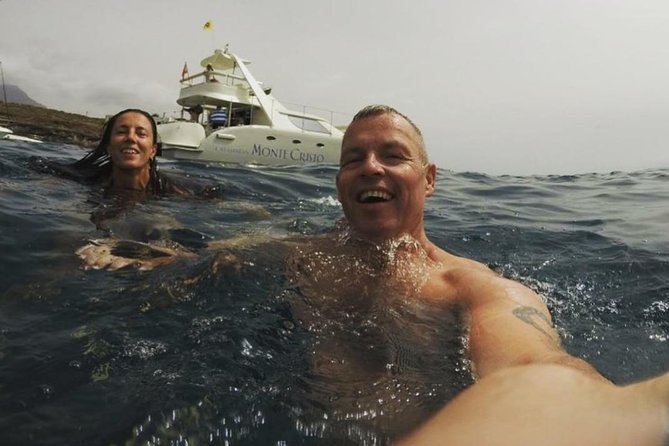 Whale Watching Catamaran Cruise with Transfer, Buffet by MC - Wildlife Expectations: Pilot Whales, Dolphins, and the Occasional Bonus